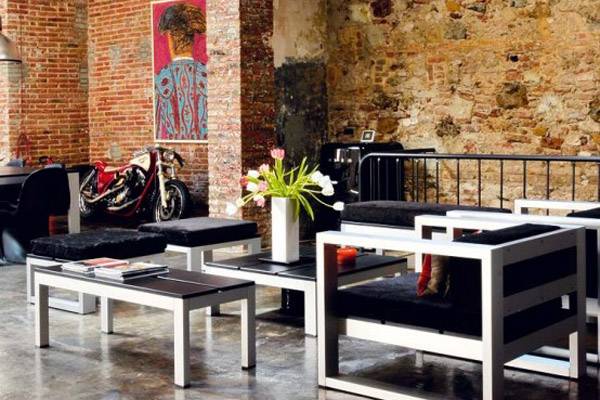 Um tipo de arte muito usado para o estilo industrial é o grafite Um tipo de arte muito usado para o estilo industrial é o grafite