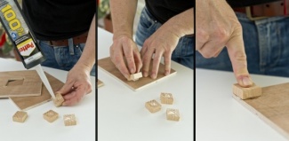 Coloque pés ( 2 cm de espessura ) de madeira com a cola quente na segunda placa que tem a passagem para o fio e pinte todas as duas placa com spray prateado. Cole o suporte para o bocal.