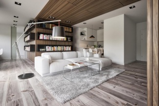 Neste aqui, a madeira marcante é para requintar e valorizar o canto de leitura desta sala;