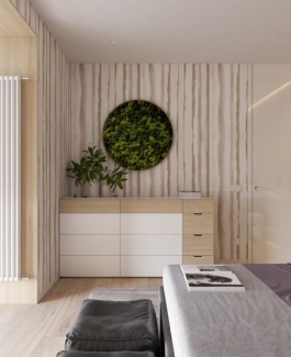 Quadro vivo com musgos e os jarros , o papel de parede que reproduz os galhos completam o clima de natureza.